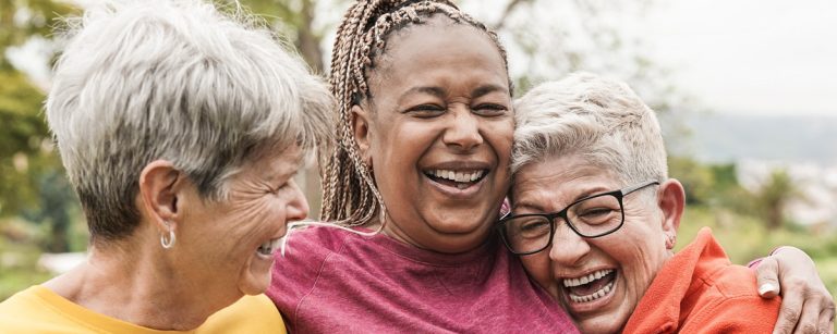 Map of world Blue Zones regions showing areas where people live longer, alongside healthy lifestyle icons such as plants, walking, and community.