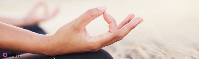 Cozy winter evening with candle and meditation setting for deep relaxation