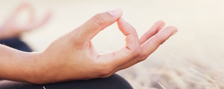 Cozy winter evening with candle and meditation setting for deep relaxation