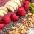 Summer smoothie bowl with raspberry, coconut and granola – colorful & protein-rich
